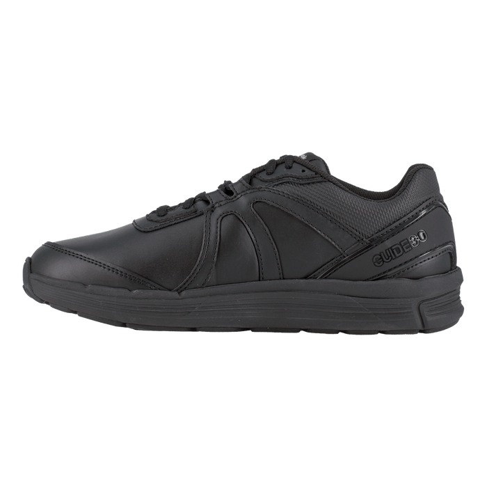 Reebok Work Guide Work shoes in all-black leather and synthetic upper with durable outsole, side view.