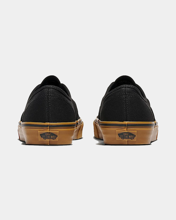 Vans Gum Authentic shoes back view in black canvas with gum rubber sole featuring "Off the Wall" branding.