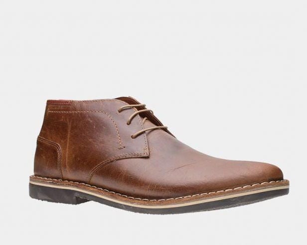 Steve Madden Harken chukka boots in smooth brown leather with stitched details and a durable sole, side angle view.