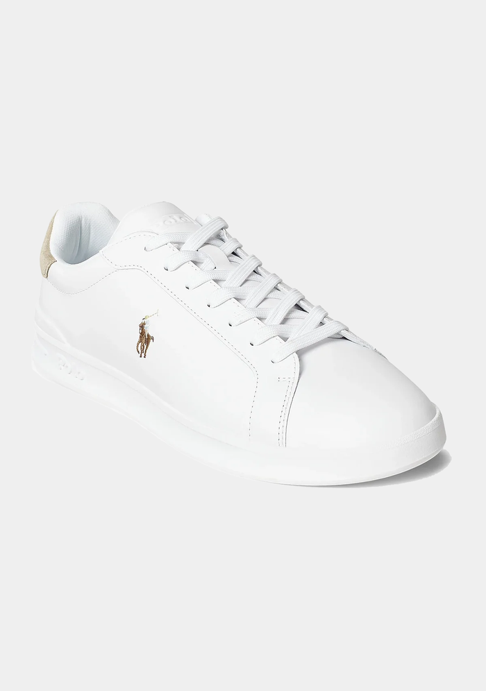 Polo Ralph Lauren Heritage Court II Leather sneakers in white with embroidered pony logo and beige suede heel tab, angled side view.