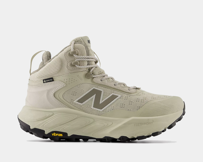New Balance Hierro Hiker hiking shoes in beige with Gore-Tex upper, Vibram outsole, and Fresh Foam cushioning, side view.