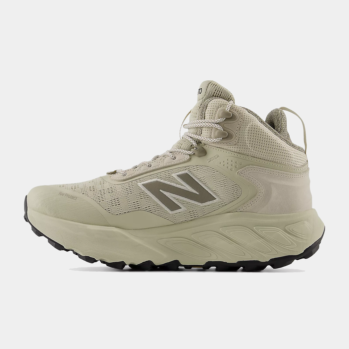 New Balance Hierro Hiker hiking boots in light beige with breathable mesh upper, rugged outsole, and lace-up closure, side view.