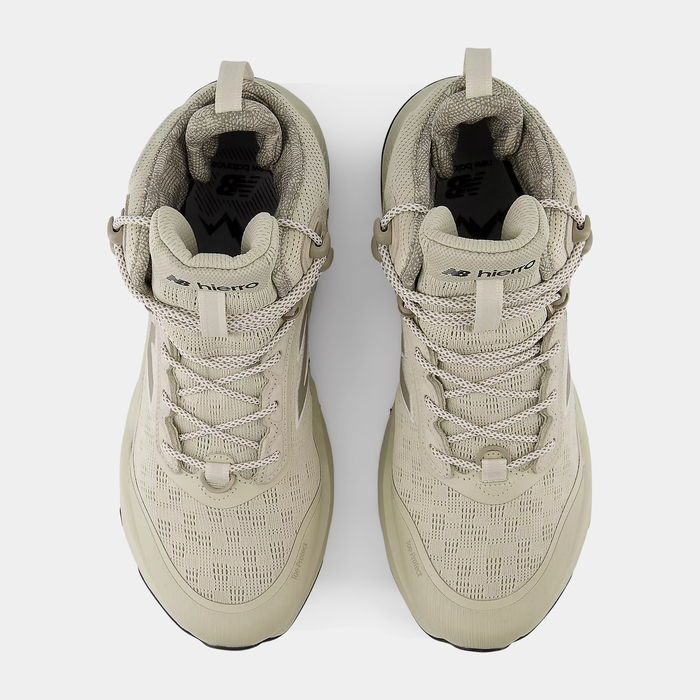 New Balance Hierro Hiker hiking shoes in beige, featuring a durable mesh upper, secure lace system, and padded collar, top view.