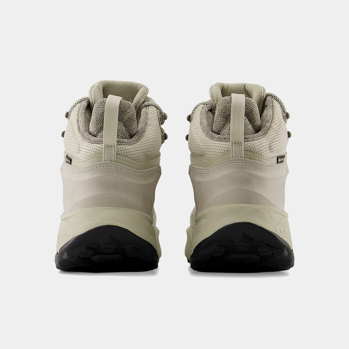 New Balance Hierro Hiker hiking boots in beige with durable mesh upper and rugged sole, back view.