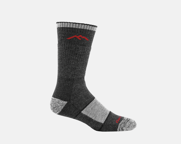 Darn Tough Hiker Boot Midweight Hiking Sock in dark gray with reinforced heel and toe, side view showing red logo and ribbed cuff.
