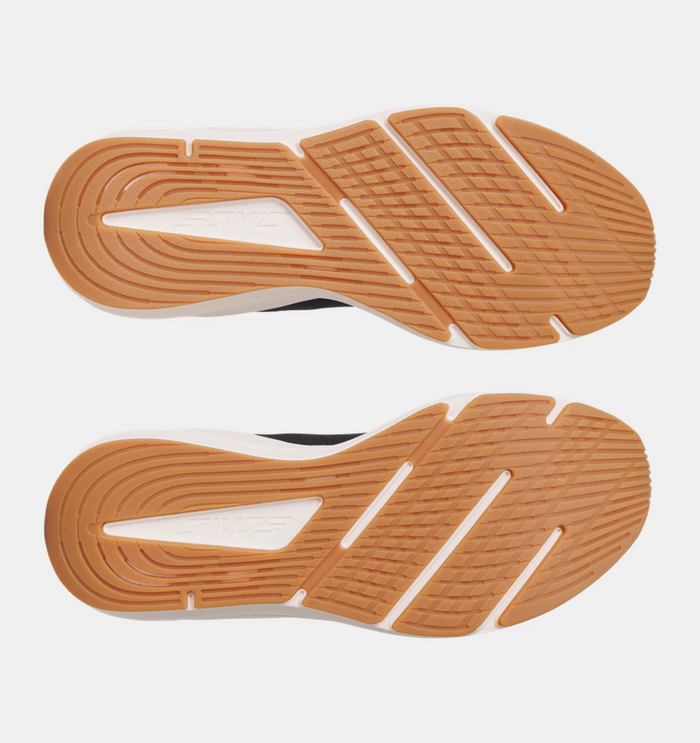 Under Armour HOVR™ Sonic 7 running shoes outsole showing grippy rubber tread pattern in orange and white, bottom view.