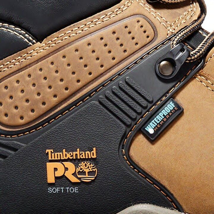 Timberland Pro Hypercharge 6" Soft Toe Work Boots close-up showing brown leather upper, waterproof membrane, and black reinforced detailing.