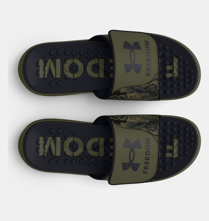 Under Armour Ignite Pro Freedom Slides, black and olive green with camo strap details and textured footbed, top view.