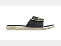 Under Armour Ignite Pro Olympus SL slides in navy blue and cream with perforated strap and cushioned sole, side view.