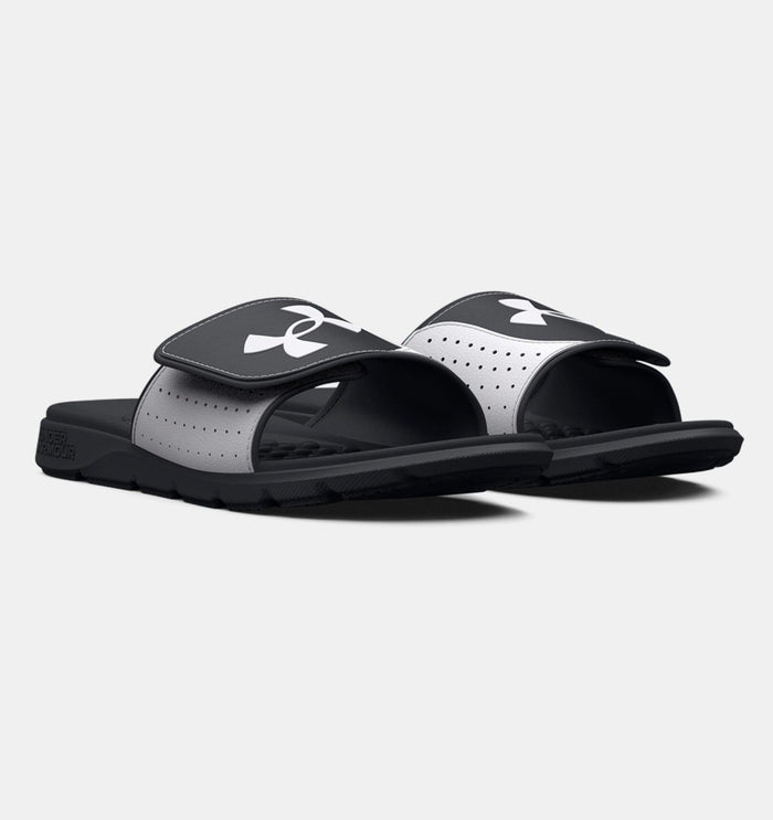Under Armour Ignite Pro SL slides in black and gray with adjustable Velcro strap and cushioned footbed, angled front view.