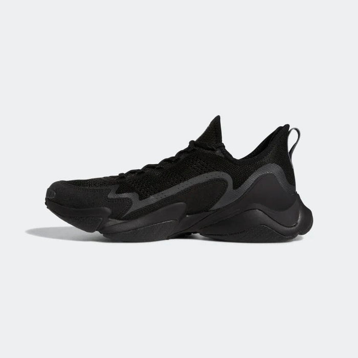 Adidas Impact FLX shoes in black with lightweight mesh upper and dynamic wave accents, side view.