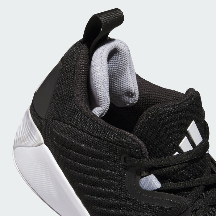 Adidas Initiation basketball shoes in black with a mesh upper, padded gray tongue, and white outsole, close-up angled view.
