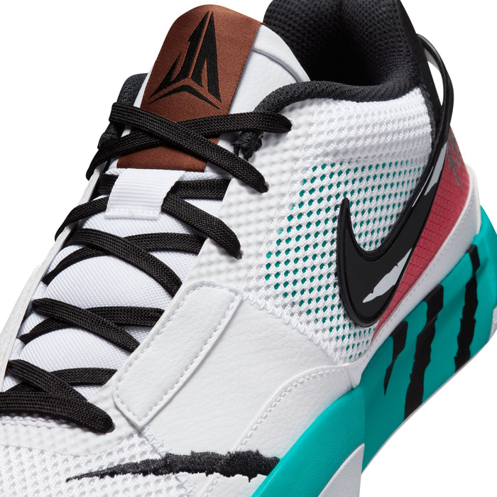 Nike Ja 1 "Scratch" basketball shoes in white with black, teal, and red accents, featuring mesh upper and bold outsole design, close-up view.