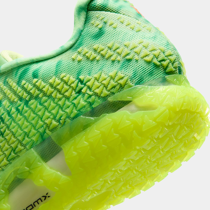 Nike Ja 3 "Halloween" basketball shoes featuring a close-up view of neon green and yellow textured mesh upper with a translucent outsole.