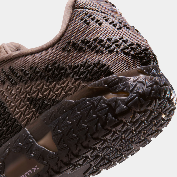 Nike Ja 3 "Mink Brown" basketball shoe featuring textured upper in brown mesh and durable outsole with multidirectional traction, close-up view.