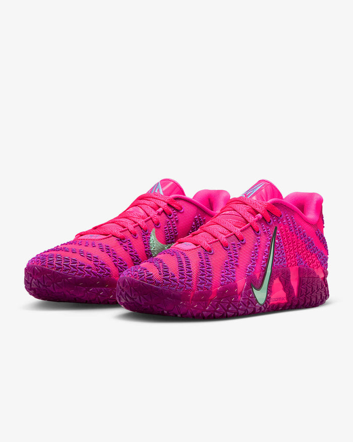 Nike Ja 3 "Price of Admission" basketball shoes in vibrant pink with purple accents, mesh upper, green Swoosh logo, and textured outsole, front angle view.