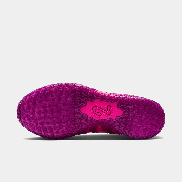 Nike Ja 3 "Price of Admission" basketball shoes outsole in vibrant pink with textured grip and branding details.
