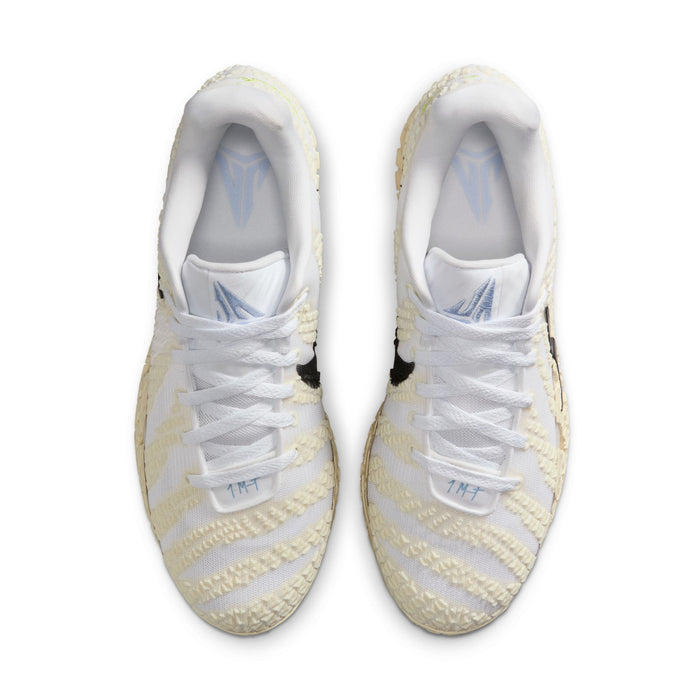 Nike Ja 3 "Sail" basketball shoes in white and cream with textured details and blue logo accents, top view.
