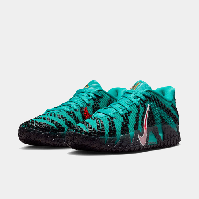 Nike Ja 3 "Scratch 3.0" basketball shoes in teal with black scratch-inspired pattern, red accents, and textured black outsole, front angle.