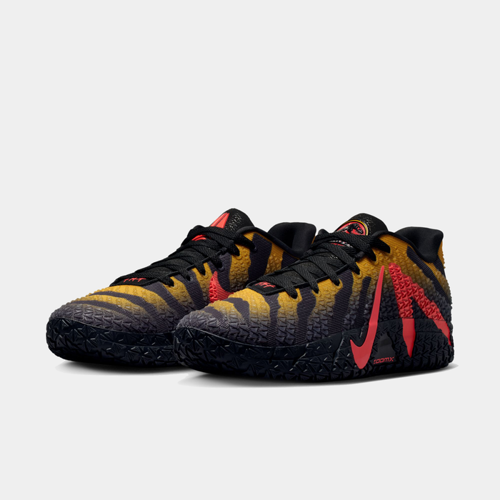 Nike Ja 3 x Jurassic Park "Raptor" basketball shoes with yellow and black gradient upper, textured black outsole, and red Nike Swoosh logo, front angle view.