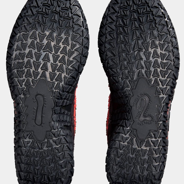 Nike Ja 3 x Jurassic Park "Raptor" basketball shoes, outsole view showcasing textured black tread pattern with Jurassic Park-inspired design.
