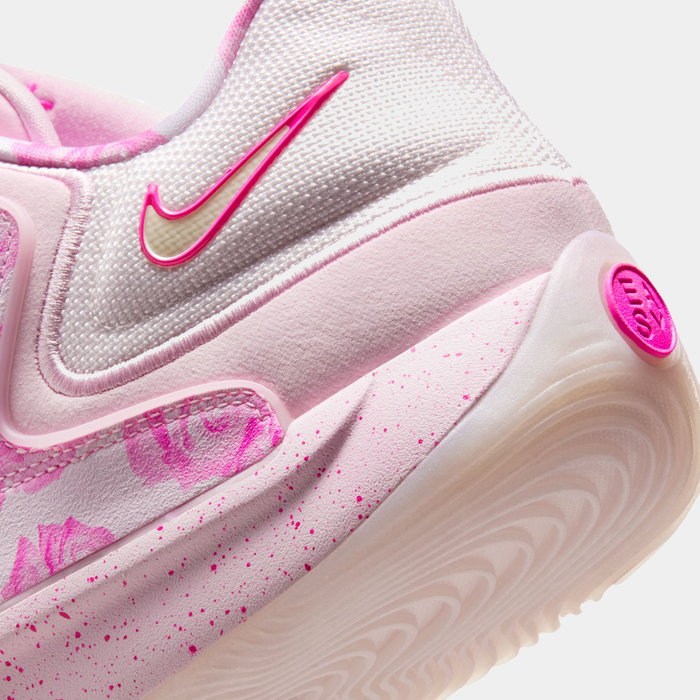 Nike KD 18 "Aunt Pearl" basketball shoes in soft pink with floral patterns, pink speckled accents, and cushioned outsole, side heel view.