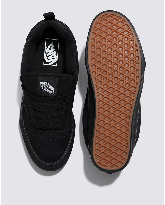 Vans Knu Skool Core sneakers in black with durable canvas upper, padded collar, and gum waffle outsole, top and sole view.