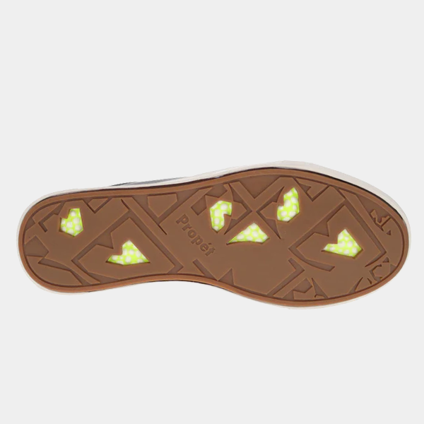 Propét Koda shoe outsole in brown with geometric tread pattern and translucent lime green accents.