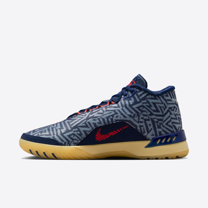 Nike LeBron NXXT Genisus basketball shoes in navy blue with a geometric patterned upper, red Swoosh logo, and yellow outsole, side view.