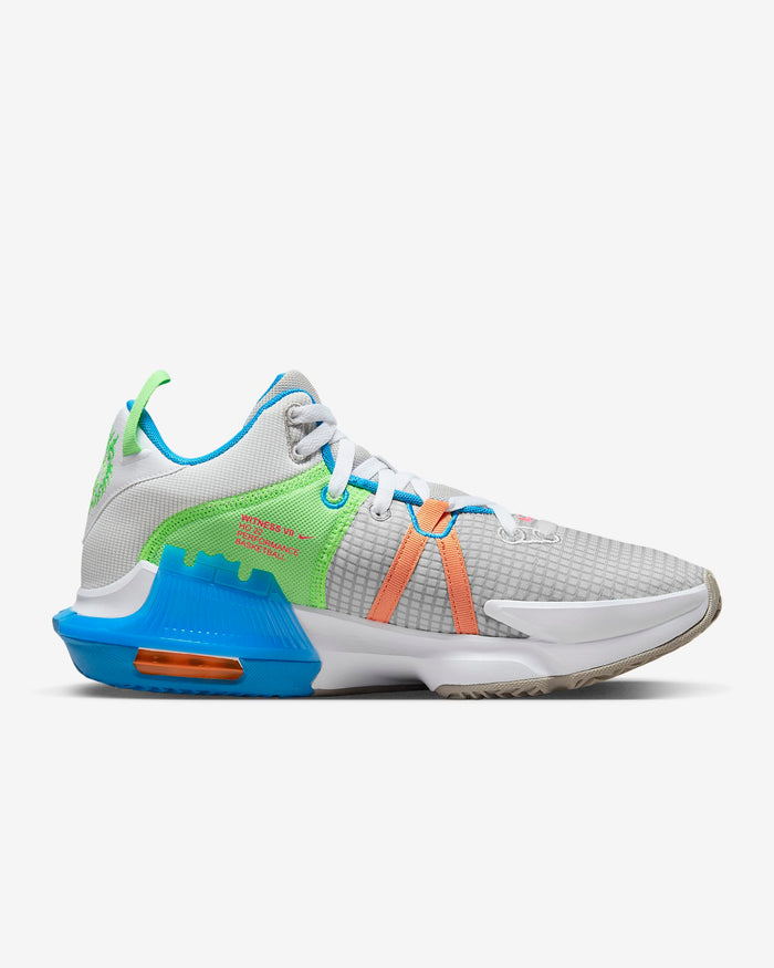 Nike LeBron Witness 7 basketball shoes in white, green, blue, and orange with mesh upper and Air cushioning, side view.