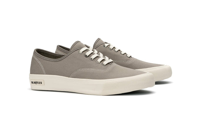 SeaVees Legend Sneaker Standard sneakers in light gray canvas with a low-top design and white rubber sole, angled side view