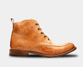 Bed Stu Lincoln 2 leather boots in tan featuring a distressed finish, closed lacing system, and pull tab, side view.