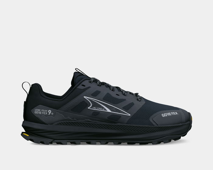 Altra Lone Peak 9 GTX trail running shoes in black with Gore-Tex waterproof upper and durable lugged outsole, side view.