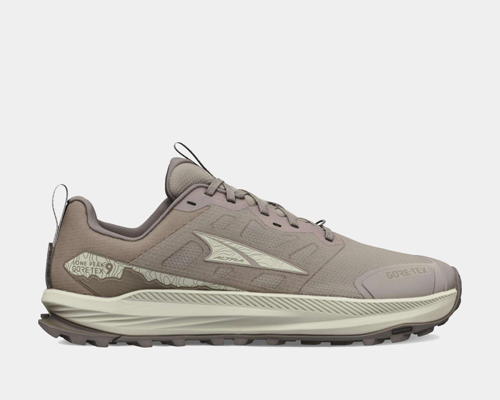 Altra Lone Peak 9 GTX trail running shoes in taupe with GORE-TEX upper, side view showing rugged outsole and reinforced toe.