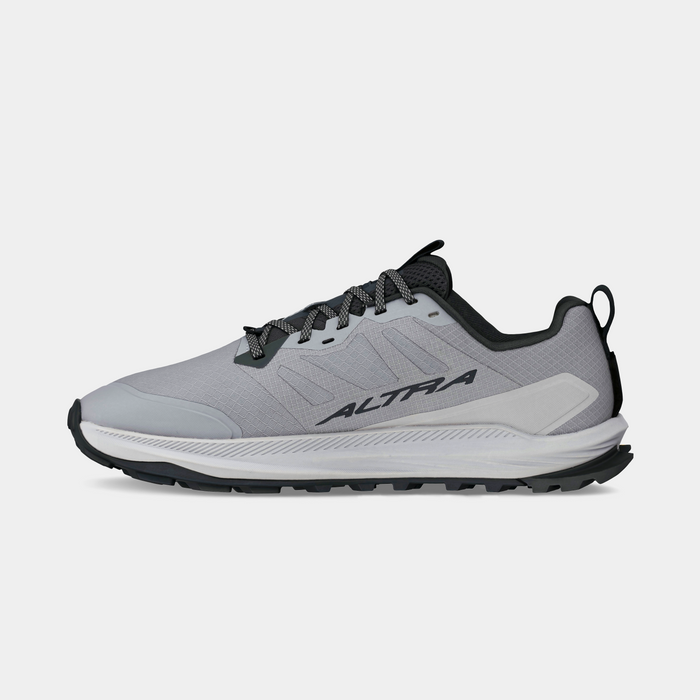 Altra Lone Peak 9+ trail running shoes in light gray with black accents, durable mesh upper, and cushioned sole, side view.
