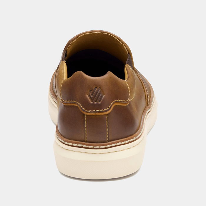 Johnston & Murphy McGuffey 2 Perfed Slip-On shoes in brown leather, back view showing heel design and logo.