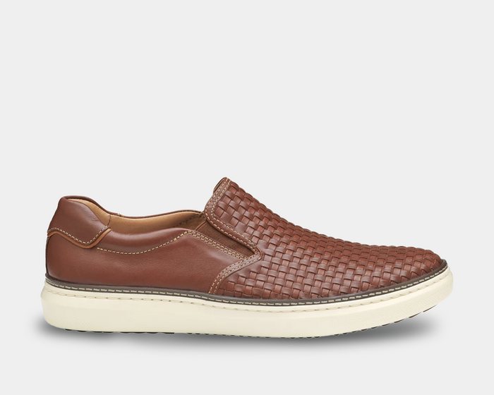 Johnston & Murphy McGuffey 2 Woven Slip-on shoes in brown leather with woven detailing, side view showing cushioned white sole.