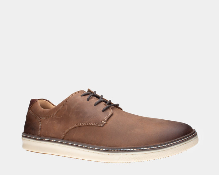 Johnston & Murphy McGuffey Plain Toe shoes in brown leather with contrasting white sole and stitched detailing, side view.