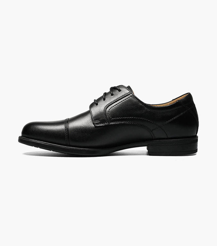 Florsheim Midtown Cap Oxford dress shoes in black leather with a cap toe design and lace-up closure, side view.