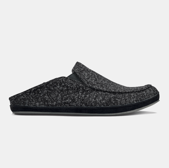 OluKai Moloa Hulu slippers in dark gray textured wool fabric with a collapsible heel and cushioned sole, side view.