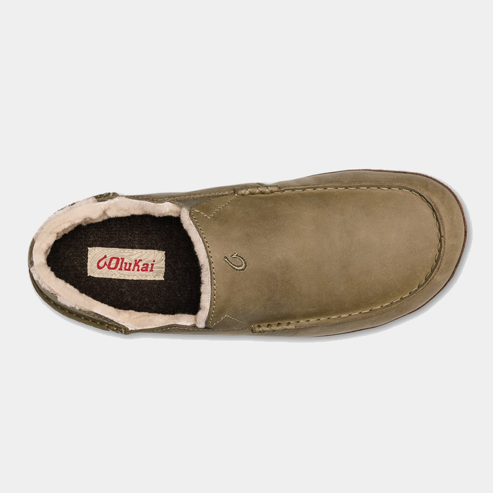 OluKai Moloa Slipper in tan leather with soft shearling lining and embroidered logo detail, top view.