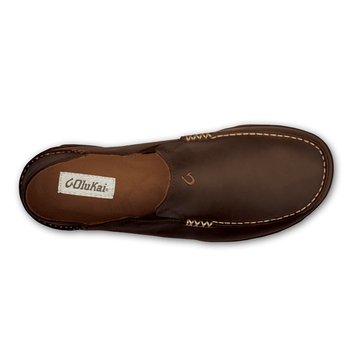 OluKai Moloa shoe in dark brown leather with contrast stitching and logo detail, top view.