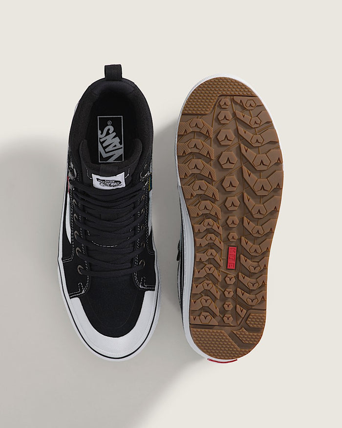 Vans MTE Sk8-Hi Waterproof Insulated Shoe in black with white accents, top view showing padded collar and rugged gum outsole with MTE grip.