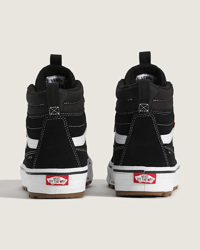 Vans MTE Sk8-Hi Waterproof Insulated Shoes back view showing black suede upper, white leather stripe, and red logo details.