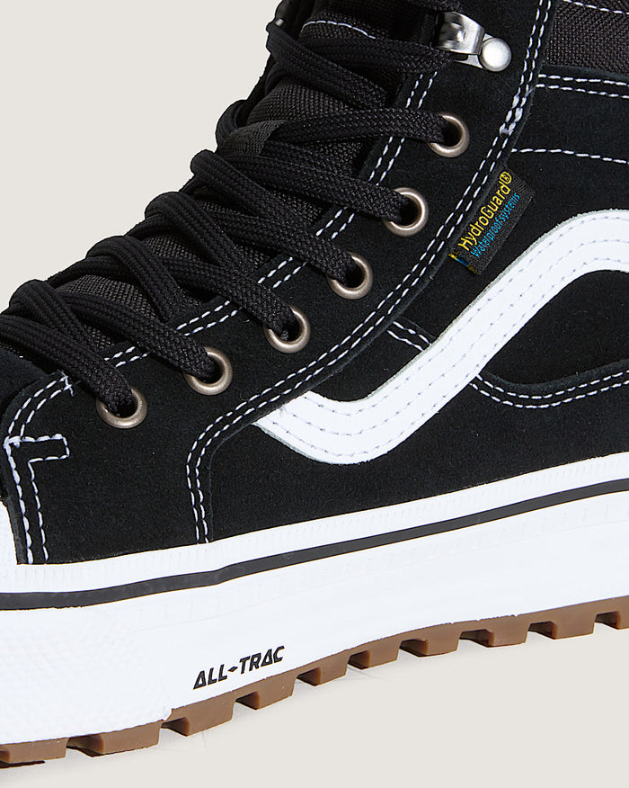 Vans MTE Sk8-Hi Waterproof Insulated Shoe in black suede with white stitching, HydroGuard waterproof system, and All-Trac outsole, side view.