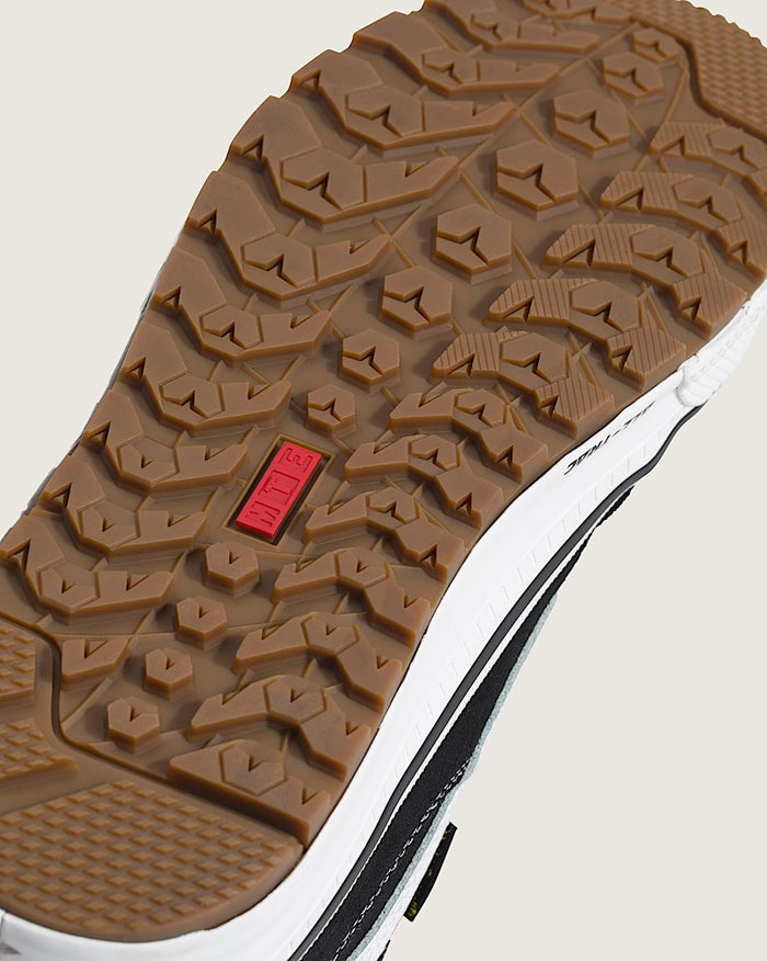 Vans MTE Sk8-Hi Waterproof Insulated Shoe outsole with rugged tread pattern in brown rubber and red MTE branding.