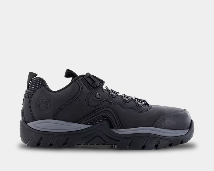 DC WorkCrew Navigator Work shoes in black with durable leather upper, metal eyelets, padded collar, and slip-resistant outsole, side view.