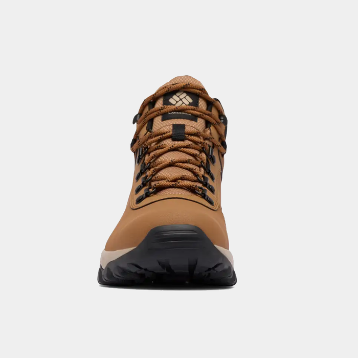 Columbia Newton Explorer hiking boots front view in tan with rugged black outsole and secure lace system.