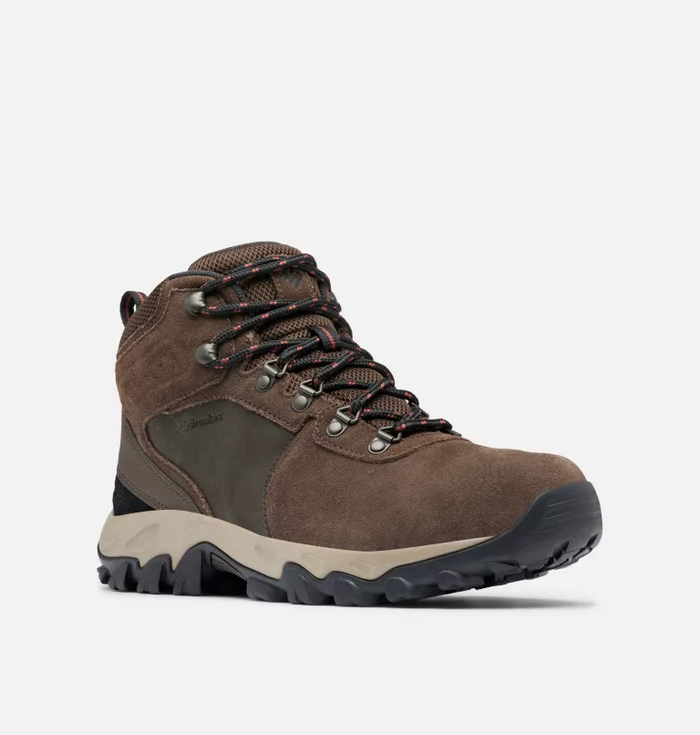 Columbia Newton Ridge™ Plus II Suede WP hiking boots in brown suede with waterproof design, metal eyelets, and rugged outsole, angled front view.