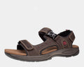 Dunham Nolan Sandal in dark brown with adjustable hook-and-loop straps, cushioned footbed, and durable outsole, side view.